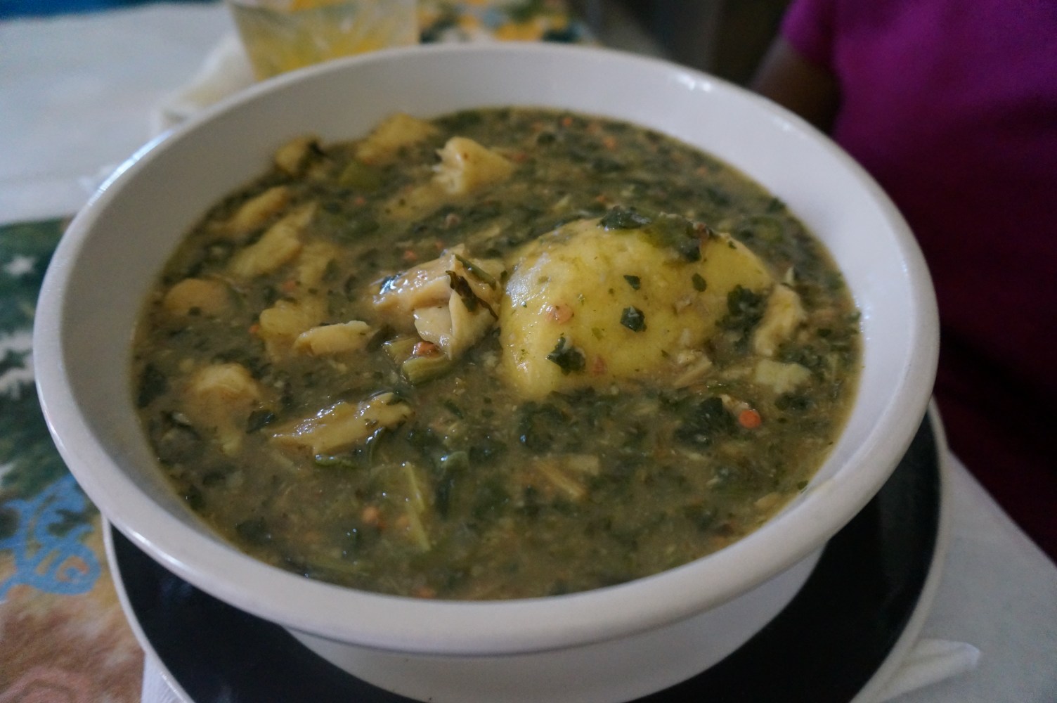 a bowl of Kallaloo, a local soup from U.S. Virgin Islands